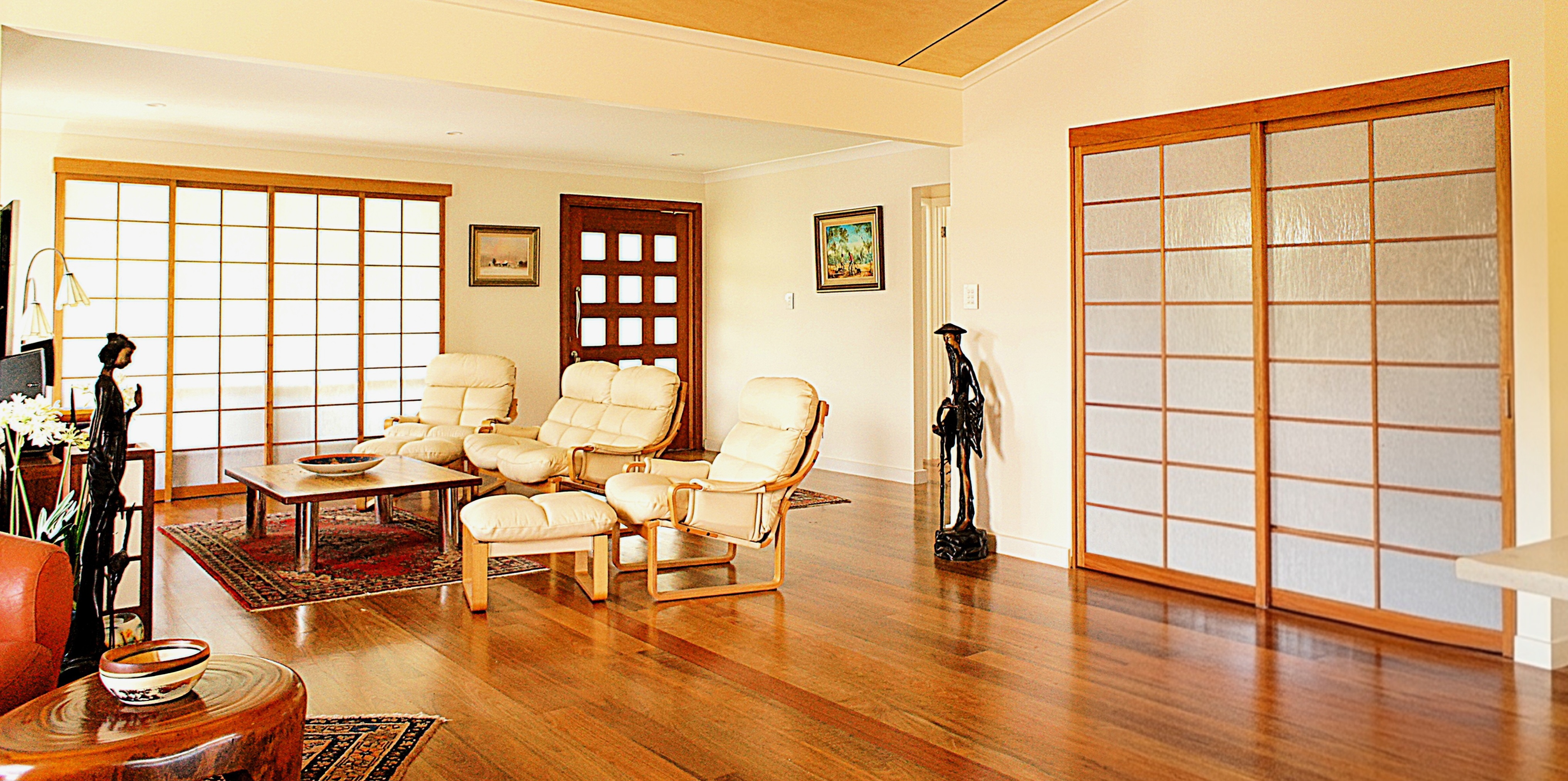 Custom Shoji screens in a warm living room interior