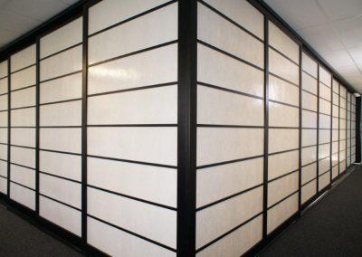 A Room Divider Wall In A Large Office